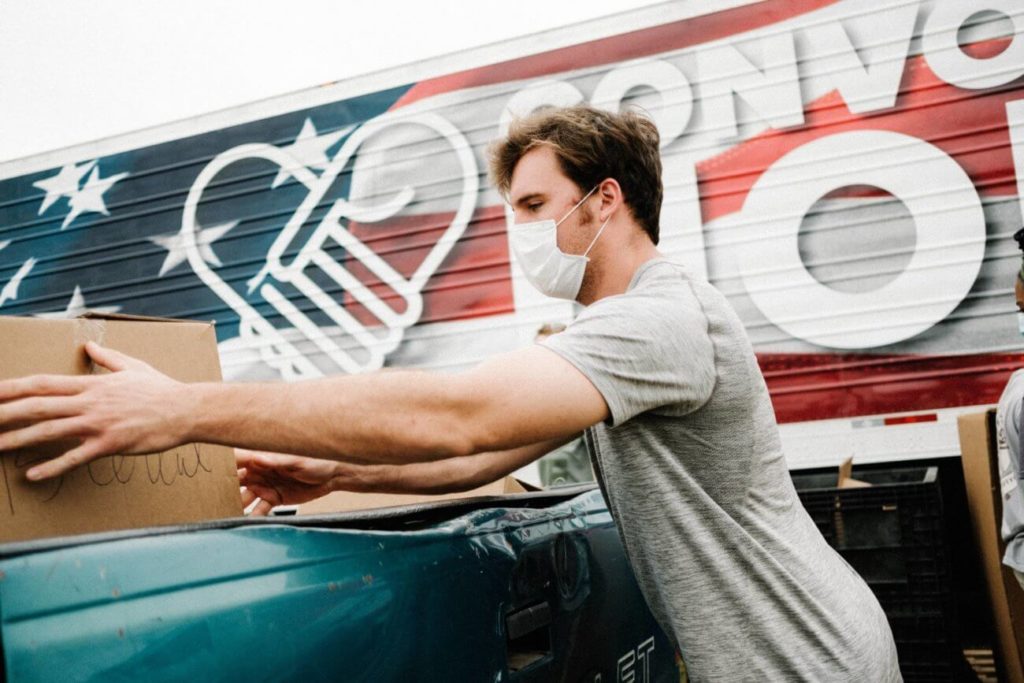 Darlington, South Carolina – Volunteers from Elevation Church load hundreds of cars with much needed food and supplies in response to the COVID-19 pandemic