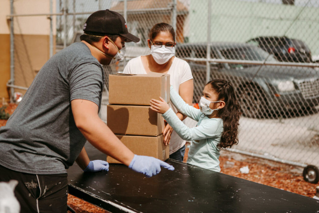 Riviera Beach, Florida – Local partners distribute food and supplies to a community hit hard by the economic impact of COVID-19